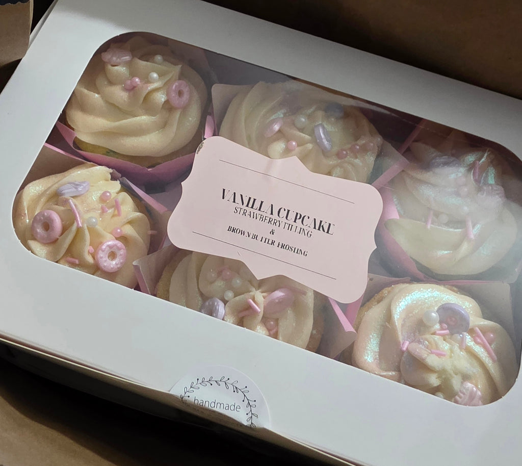 One dozen filled cupcakes